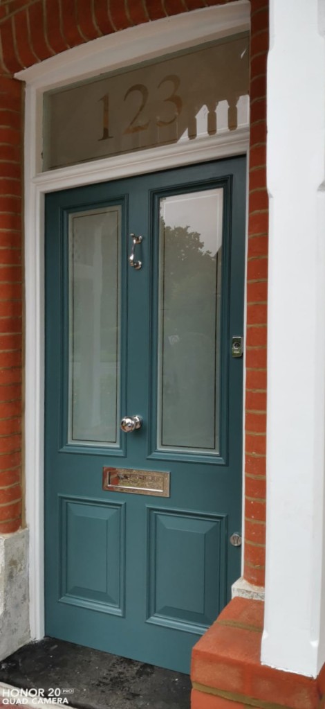 Amazing period front door  painted in blue-green colour