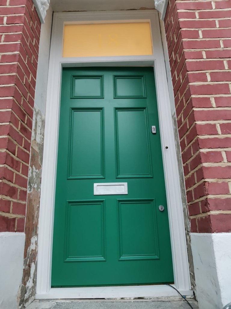 The look of this Victorian front door is softened by the clear glass of the stunning fanlight.