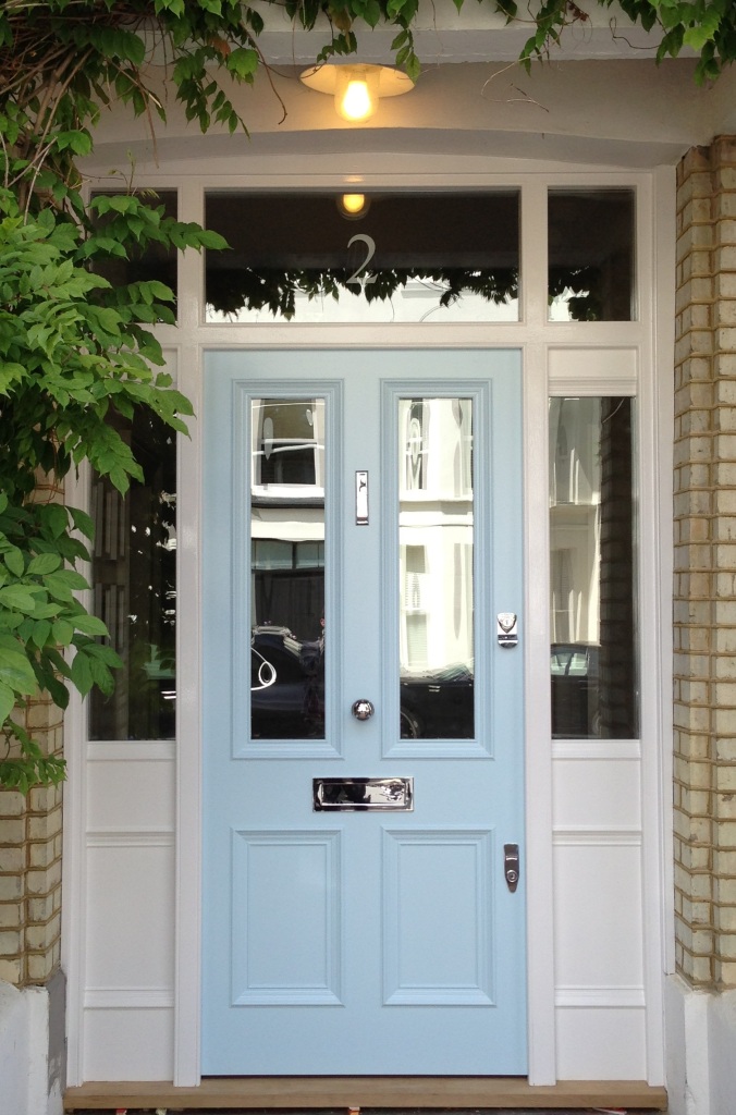 The door design features two traditional glass panels and chrome detailing , expertly painted in our refreshing colour.